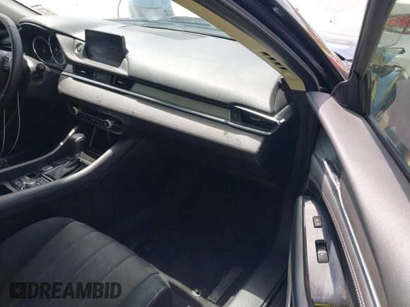 2018 Mazda 6 Sport with VIN JM1GL1UM7J1334658, listed as a IAAI auction lot 41938763 with 129,563 mi miles. Bid and sale history available at carsss.com. Image 5.
