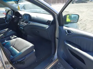 2007 Honda Odyssey EX-L with VIN 5FNRL387X7B080906, listed as a IAAI auction lot 41910061 with 229,717 mi miles and . Bid and sale history available at DreamBid. Image 5.