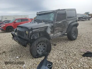 2017 Jeep Wrangler Willys Wheeler with VIN 1C4AJWAG9HL673766, listed as a Copart auction lot 43132555 with 129,422 mi miles and Salvage Title. Bid and sale history available at DreamBid. Image 1.