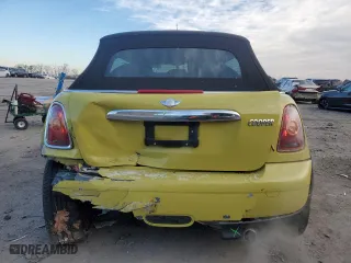 2009 MINI Cooper Convertible with VIN WMWMR33549TU95327, listed as a Copart auction lot 88493115 with 76,714 mi miles and Salvage Title. Bid and sale history available at carsss.com. Image 6.