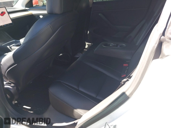 2022 Tesla Model 3 with VIN 5YJ3E1EA5NF168201, listed as a IAAI auction lot 41855273 with 31,393 mi miles and . Bid and sale history available at DreamBid. Image 8.
