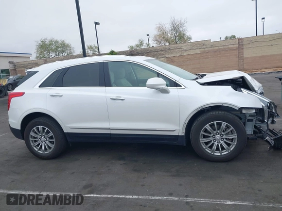 2019 Cadillac XT5 Luxury FWD with VIN 1GYKNCRS2KZ158560, listed as a IAAI auction lot 42067397 with 48,816 mi miles and . Bid and sale history available at DreamBid. Image 14.