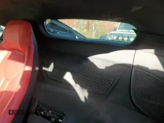 2018 Audi R8 V10 z VIN WUABAAFX5J7902445, wystawiony jako Copart lot #80124934 z przebiegiem Nie podano mil oraz Szkody całkowita. Historia ofert i sprzedaży dostępna na DreamBid. Obrazek 10.
