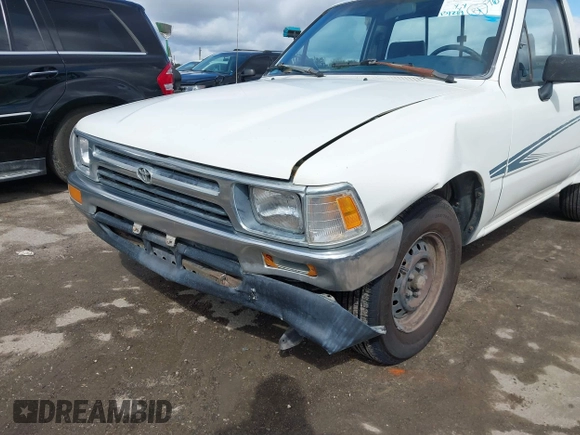 1992 Toyota Pickup DLX z VIN 4TARN81PXNZ004395, wystawiony jako IAAI lot #41729264 z przebiegiem 137 289 mil mil oraz . Historia ofert i sprzedaży dostępna na DreamBid. Obrazek 6.