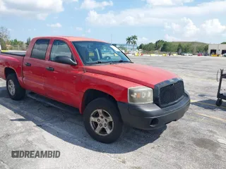 2006 Dodge Dakota SLT with VIN 1D7HE48K06S517772, listed as a IAAI auction lot 41946417 with 255,236 mi miles. Bid and sale history available at carsss.com. Image 1.