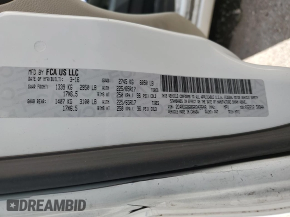 2016 Dodge Grand Caravan SE with VIN 2C4RDGBG8GR342648, listed as a Copart auction lot 46919475 with 117,305 mi miles and Salvage Title. Bid and sale history available at DreamBid. Image 13.