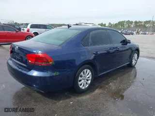 2014 Volkswagen Passat Wolfsburg Ed with VIN 1VWAT7A3XEC085932, listed as a IAAI auction lot 41567573 with 165,154 mi miles. Bid and sale history available at carsss.com. Image 4.