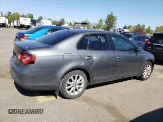2010 Volkswagen Jetta SE z VIN 3VWRX7AJ4AM129714, wystawiony jako Copart lot #52975835 z przebiegiem 166 554 mil mil oraz Szkoda całkowita • Salvage title. Historia ofert i sprzedaży dostępna na DreamBid. Obrazek 3.