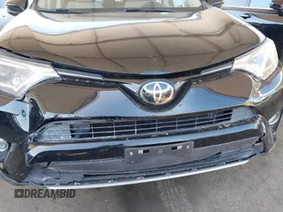 2018 Toyota RAV4 XLE with VIN 2T3WFREV2JW502622, listed as a IAAI auction lot 42327598 with 94,997 mi miles and . Bid and sale history available at DreamBid. Image 6.