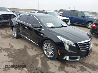2019 Cadillac XTS Luxury z VIN 2G61M5S36K9115114, wystawiony jako IAAI lot #41436291 z przebiegiem 122 982 mil mil oraz . Historia ofert i sprzedaży dostępna na DreamBid. Obrazek 1.