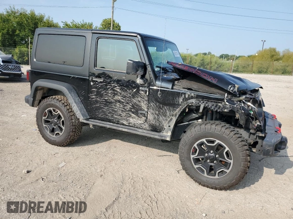 2015 Jeep Wrangler Rubicon Hard Rock z VIN 1C4BJWCG9FL714606, wystawiony jako Copart lot #68521014 z przebiegiem 35 187 mil mil oraz Szkoda całkowita • Salvage title. Historia ofert i sprzedaży dostępna na DreamBid. Obrazek 4.