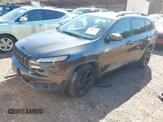 2016 Jeep Cherokee Latitude with VIN 1C4PJLCB8GW209598, listed as a IAAI auction lot 41506547 with 122,598 mi miles. Bid and sale history available at carsss.com. Image 17.