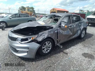 2016 Kia Optima LX with VIN 5XXGT4L35GG022118, listed as a IAAI auction lot 41506708 with 113,160 mi miles. Bid and sale history available at carsss.com. Image 2.