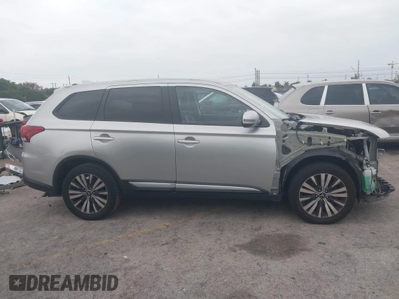 2020 Mitsubishi Outlander SE with VIN JA4AD3A38LZ025290, listed as a IAAI auction lot 41645284 with 81,044 mi miles and . Bid and sale history available at DreamBid. Image 14.