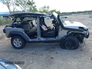 2018 Jeep Wrangler Unlimited Sport S с VIN 1C4HJXDG7JW170077, выставлен на аукционе IAAI как лот 42019911 с пробегом Не указан миль и . История ставок и продаж доступна на DreamBid. Изображение 14.