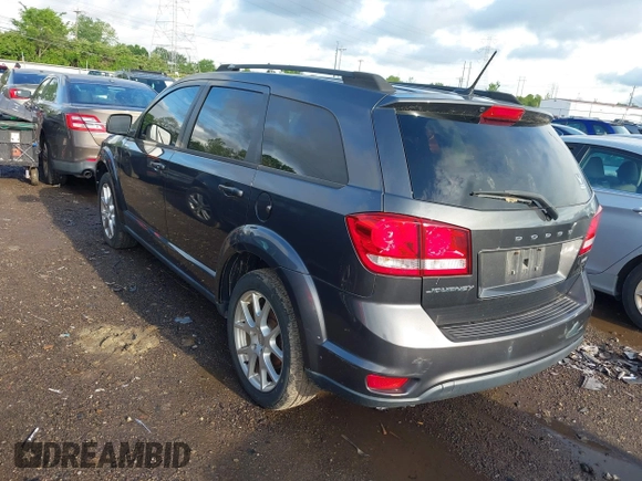 2014 Dodge Journey SXT with VIN 3C4PDCBB3ET172374, listed as a IAAI auction lot 42188228 with 138,129 mi miles. Bid and sale history available at carsss.com. Image 3.