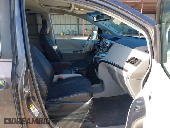2014 Toyota Sienna SE with VIN 5TDXK3DC7ES482954, listed as a IAAI auction lot 41197465 with 160,107 mi miles and . Bid and sale history available at DreamBid. Image 5.