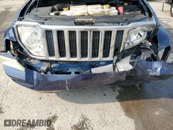 2012 Jeep Liberty Sport z VIN 1C4PJMAK4CW200786, wystawiony jako Copart lot #60430345 z przebiegiem 135 841 mil mil oraz Szkoda całkowita • Salvage title. Historia ofert i sprzedaży dostępna na DreamBid. Obrazek 12.