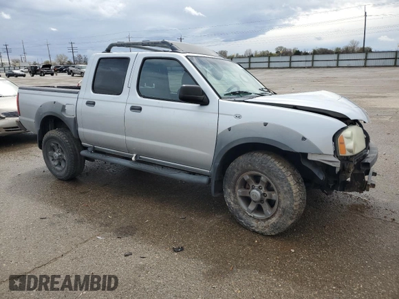 2002 Nissan Frontier SE with VIN 1N6ED27T92C379360, listed as a Copart auction lot 51235495 with 230,598 mi miles and Salvage title. Bid and sale history available at DreamBid. Image 4.