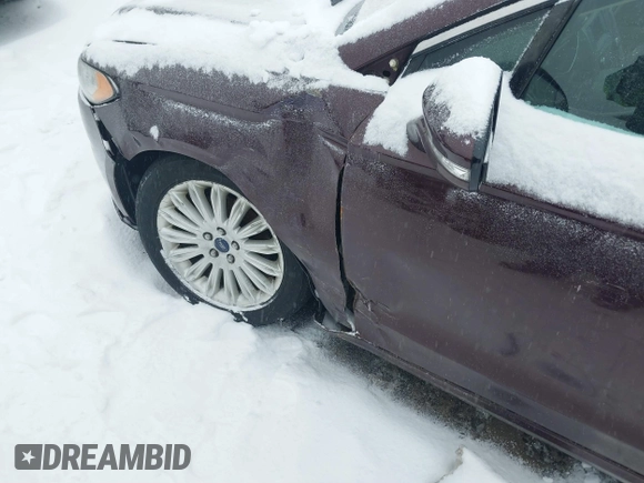2013 Ford Fusion SE Hybrid with VIN 3FA6P0LU1DR316619, listed as a IAAI auction lot 41515812 with 136,669 mi miles and . Bid and sale history available at carsss.com. Image 6.