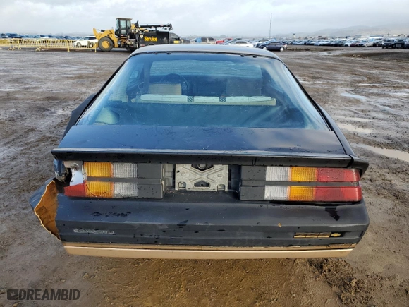 1984 Chevrolet Camaro Z28 Sport with VIN 1G1AP87G7EL175104, listed as a Copart auction lot 86895534 with 27,874 mi miles and Salvage Title. Bid and sale history available at carsss.com. Image 6.