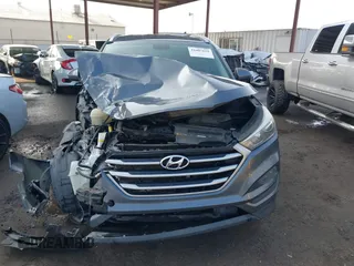 2018 Hyundai Tucson SEL with VIN KM8J33A47JU768935, listed as a IAAI auction lot 41007821 with 125,678 mi miles. Bid and sale history available at carsss.com. Image 12.