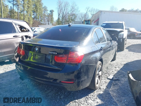 2012 BMW 3 Series 328i with VIN WBA3A5C58CF258408, listed as a IAAI auction lot 41597446 with 227,855 mi miles. Bid and sale history available at carsss.com. Image 4.