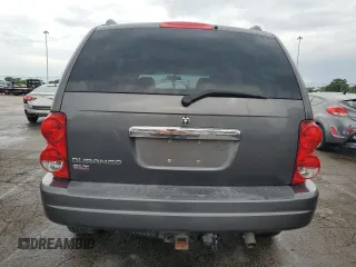 2004 Dodge Durango SLT z VIN 1D4HB48N14F168496, wystawiony jako Copart lot #59863915 z przebiegiem 99 629 mil mil oraz Szkoda całkowita • Salvage title. Historia ofert i sprzedaży dostępna na DreamBid. Obrazek 6.