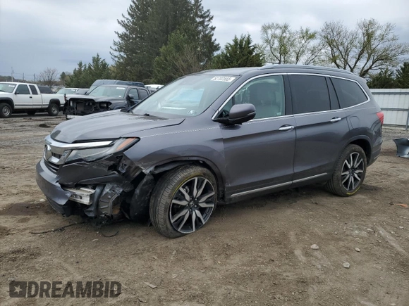 2020 Honda Pilot Touring 7-Passenger z VIN 5FNYF6H69LB005829, wystawiony jako Copart lot #52702555 z przebiegiem 90 746 mil mil oraz Szkoda całkowita • Salvage title. Historia ofert i sprzedaży dostępna na DreamBid. Obrazek 1.