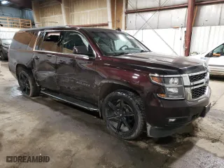 2020 Chevrolet Suburban LT with VIN 1GNSKHKC2LR210311, listed as a Copart auction lot 48062535 with 73,737 mi miles and Salvage Title. Bid and sale history available at carsss.com. Image 4.
