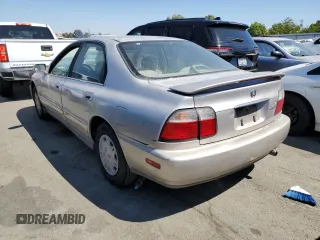 1997 Honda Accord Value with VIN 1HGCD5683VA171467, listed as a Copart auction lot 66351414 with 350,770 mi miles and Salvage Title. Bid and sale history available at carsss.com. Image 2.