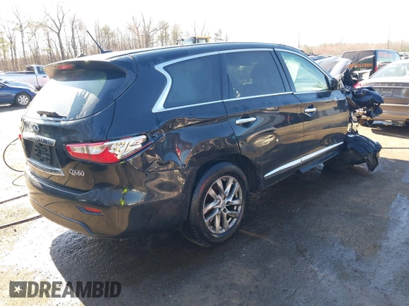 2015 Infiniti QX60 with VIN 5N1AL0MM5FC500781, listed as a IAAI auction lot 41850668 with 104,811 mi miles. Bid and sale history available at carsss.com. Image 4.