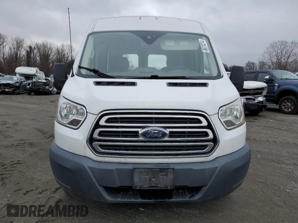 2015 Ford Transit Cargo with VIN 1FTYE1CM7FKA24477, listed as a Copart auction lot 86310214 with 54,098 mi miles and Salvage title. Bid and sale history available at DreamBid. Image 5.