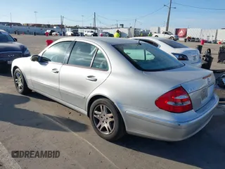 2005 Mercedes-Benz E-Class 3.2L with VIN WDBUF65JX5A718711, listed as a IAAI auction lot 41625603 with 145,024 mi miles. Bid and sale history available at carsss.com. Image 3.