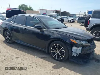 2018 Toyota Camry LE z VIN 4T1B11HK6JU057374, wystawiony jako IAAI lot #41952186 z przebiegiem 93 128 mil mil oraz . Historia ofert i sprzedaży dostępna na DreamBid. Obrazek 1.