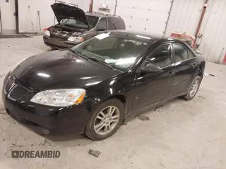 2006 Pontiac G6 6-Cyl with VIN 1G2ZG558664259127, listed as a IAAI auction lot 41987539 with 180,171 mi miles. Bid and sale history available at carsss.com. Image 2.