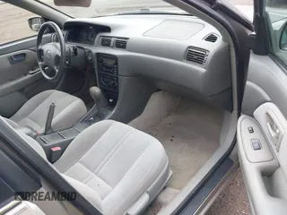 2001 Toyota Camry CE z VIN 4T1BG22K31U097733, wystawiony jako IAAI lot #42276687 z przebiegiem 180 357 mil mil oraz . Historia ofert i sprzedaży dostępna na DreamBid. Obrazek 5.