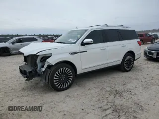 2020 Lincoln Navigator Black Label with VIN 5LMJJ2TT7LEL19771, listed as a Copart auction lot 46167285 with 99,753 mi miles and Salvage title. Bid and sale history available at DreamBid. Image 1.