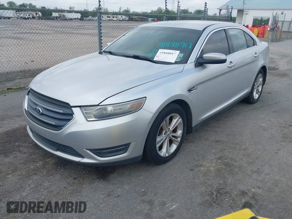 2013 Ford Taurus SEL with VIN 1FAHP2E81DG129229, listed as a IAAI auction lot 41898917 with 205,865 mi miles. Bid and sale history available at carsss.com. Image 2.