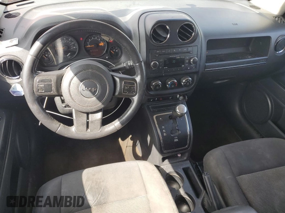 2016 Jeep Patriot Latitude with VIN 1C4NJPFA1GD810655, listed as a Copart auction lot 61093715 with 172,936 mi miles and Salvage title. Bid and sale history available at DreamBid. Image 8.