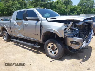 2021 Ram 2500 Laramie with VIN 3C6UR5NL2MG509717, listed as a IAAI auction lot 42308636 with 129,016 mi miles and . Bid and sale history available at DreamBid. Image 1.