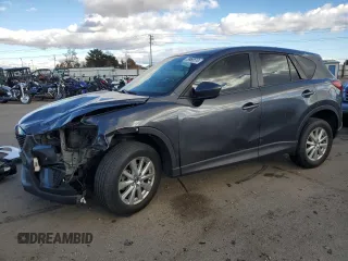2015 Mazda CX-5 Sport with VIN JM3KE4BE0F0441203, listed as a Copart auction lot 79968514 with 134,890 mi miles and Salvage title. Bid and sale history available at DreamBid. Image 1.