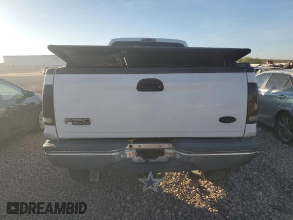 1999 Ford F-350 XL with VIN 1FTSW31F8XED52624, listed as a Copart auction lot 86359524 with 310,829 mi miles and Salvage title. Bid and sale history available at DreamBid. Image 6.