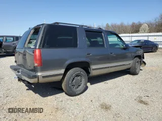 1999 GMC Yukon with VIN 1GKEC13R9XJ805842, listed as a Copart auction lot 48952625 with 259,149 mi miles and Clean Title. Bid and sale history available at carsss.com. Image 3.