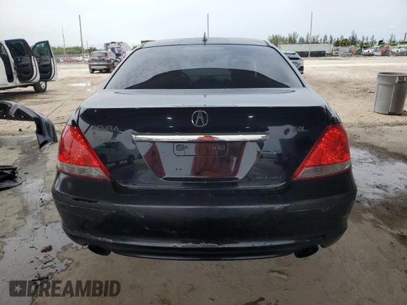 2005 Acura RL z VIN JH4KB16535C018850, wystawiony jako Copart lot #59306055 z przebiegiem 131 881 mil mil oraz Szkoda całkowita • Salvage title. Historia ofert i sprzedaży dostępna na DreamBid. Obrazek 6.