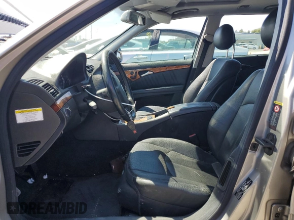 2005 Mercedes-Benz E 500 with VIN WDBUH83J35X168838, listed as a Copart auction lot 69885014 with 203,187 mi miles and Salvage Title. Bid and sale history available at carsss.com. Image 7.