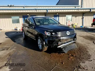 2016 Volkswagen Touareg Sport z VIN WVGEP9BP3GD004865, wystawiony jako Copart lot #87610915 z przebiegiem Nie podano mil oraz Szkoda całkowita • Salvage title. Historia ofert i sprzedaży dostępna na DreamBid. Obrazek 14.