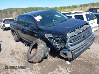 2014 Toyota Tundra 4WD Truck SR5 with VIN 5TFDW5F15EX337114, listed as a IAAI auction lot 41734727 with 209,163 mi miles. Bid and sale history available at carsss.com. Image 1.