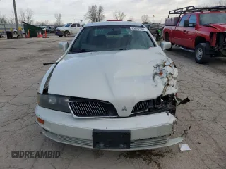 2002 Mitsubishi Diamante LS z VIN 6MMAP67P62T018175, wystawiony jako Copart lot #52052285 z przebiegiem 182 739 mil mil oraz Szkoda całkowita • Salvage title. Historia ofert i sprzedaży dostępna na DreamBid. Obrazek 5.