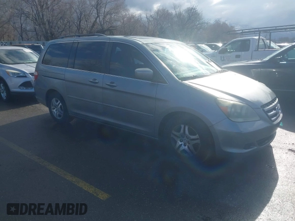 2006 Honda Odyssey EX-L with VIN 5FNRL386X6B018587, listed as a IAAI auction lot 41725966 with 168,215 mi miles. Bid and sale history available at carsss.com. Image 1.